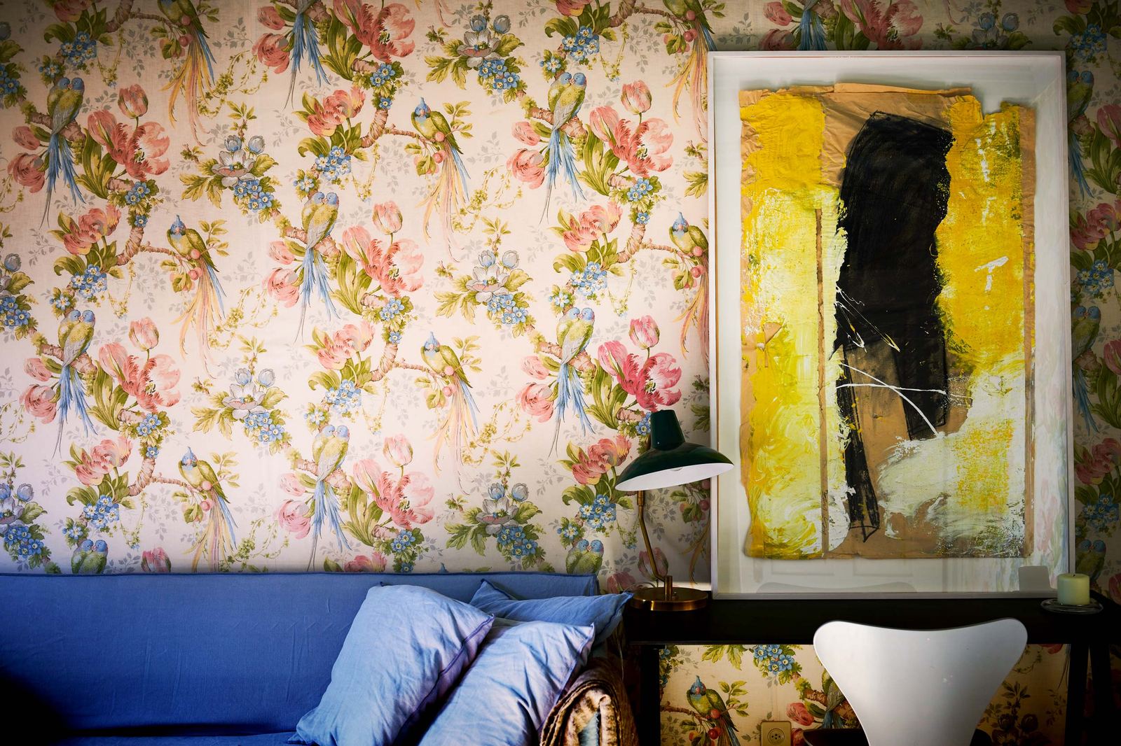 Reading corner with floral wallpaper